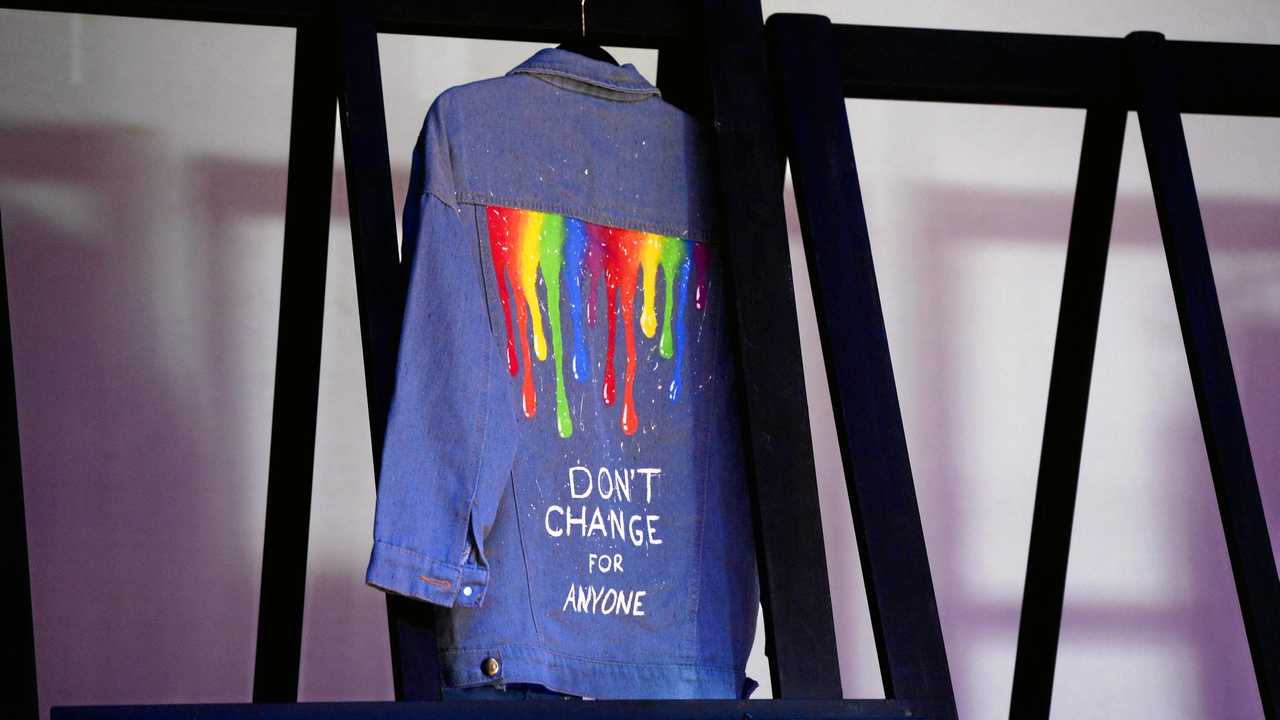 Olivia would paint denim jackets with slogans for friends. Picture: Michelle Gately