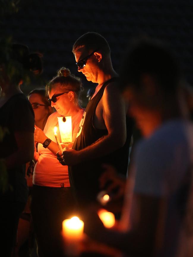 People gathered for a candle light vigil in front of Teresa Bradford's residence in Matas Drive where she died in a murder-suicide, Pimpama, Gold Coast. Photo: Regi Varghese