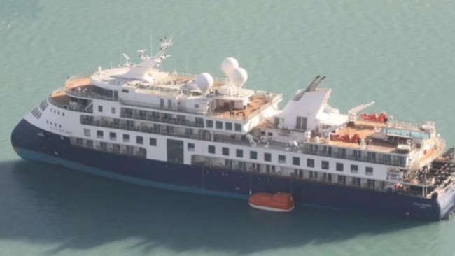 The 104-metre long, 18-metre wide Ocean Explorer ran aground on Monday in Alpefjord, in the Northeast Greenland National Park. Picture: Facebook/Joint Arctic Command