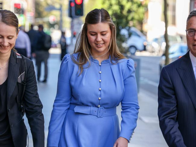 5/3/2024Teresa Ward,next to Higgins and Leon ZwierShares Lawyer Jason Maclaurin next to Sharaz on r looking at picBrittany Higgins and David Sharaz arrive at David Malcolm Justice Centre to meet face to face with Linda Reynolds as part of a court-ordered mediation. Reynolds is suing the engaged couple for defamation.Pic  Colin Murty