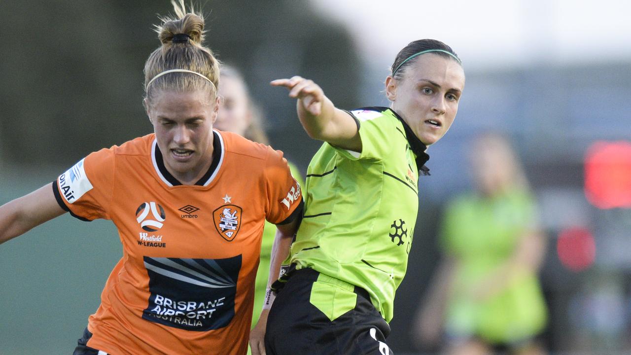 Natalie Tathem of Brisbane (left) and Olivia Price of Canberra (right) during the Round 9 W-League match between Canberra United and Brisbane Roar at McKellar Park in Canberra, Thursday, December 27, 2018. (AAP Image/Rohan Thomson) NO ARCHIVING, EDITORIAL USE ONLY