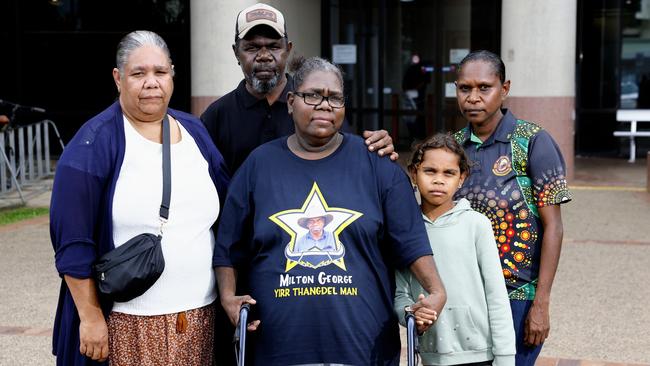 Family of Mr George (L-R) Francine Gilbert, Jacob Aidan, Gwenette George, Taylilah Zingle and Elwina Bernard comfort each other outside the Cairns Coroner's Court on the final day of the coronial inquest into his death in police custody in November 2022. Picture: Brendan Radke