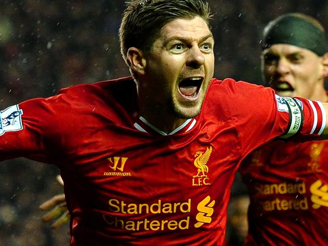 LIVERPOOL, ENGLAND - JANUARY 28: Steven Gerrard of Liverpool celebrates after scoring the opening goal during the Barclays Premier League match between Liverpool and Everton at Anfield on January 28, 2014 in Liverpool, England. (Photo by Laurence Griffiths/Getty Images)