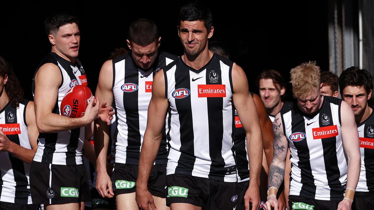 AFL Round15 . Colliongwood vs Fremantle at Marvel Stadium, Melbourne. 26/06/2021. Scott Pendlebury of the Magpies leads his team onto Marvel Stadium . Pic: Michael Klein