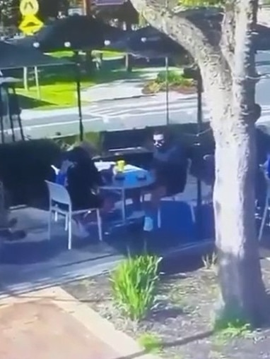 The CCTV initially shows Gavin Preston (back to camera) and Abbas Maghnie Junior eating at the cafe. Picture: X/meanwhileinau.