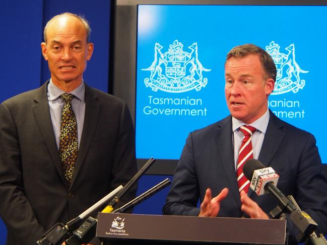 Primary Industries Minister Guy Barnett and Premier Will Hodgman assured the public that Tasmanian salmon was safe to eat.