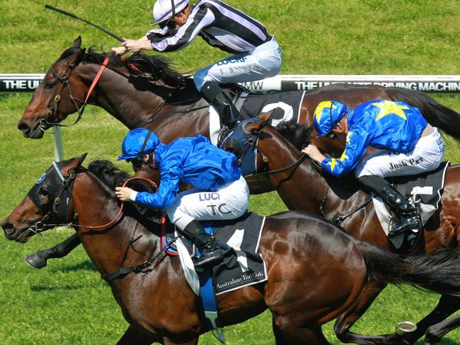 Bezel ridden by Tim Clark (blue) wins race 3 in a photo finish to Alliterate ridden by Koby Jennings at Royal Randwick. Pic Jenny Evans