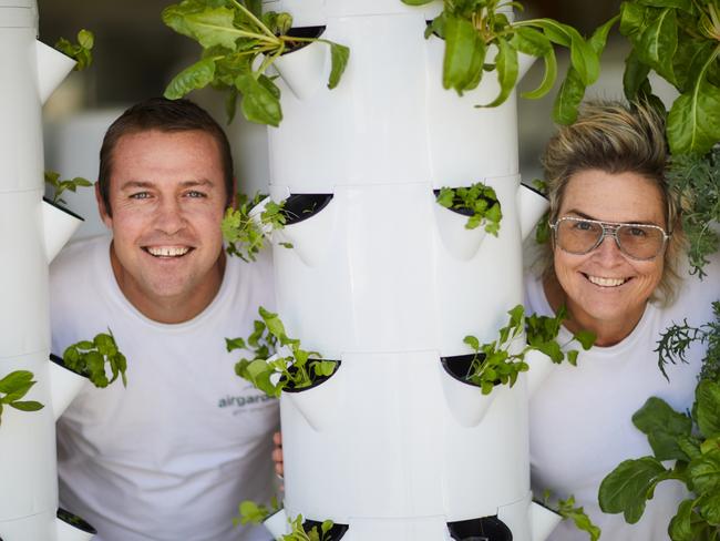 Siblings Prue and Tom Bauer with their Airgarden system for growing veggies