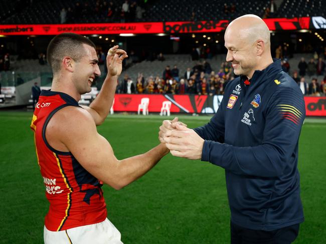 MELBOURNE, AUSTRALIA - JULY 19: Josh Rachele of the Crows and Matthew Nicks, Senior Coach of the Crows celebrate during the 2024 AFL Round 19 match between the Essendon Bombers and the Adelaide Crows at Marvel Stadium on July 19, 2024 in Melbourne, Australia. (Photo by Michael Willson/AFL Photos via Getty Images)