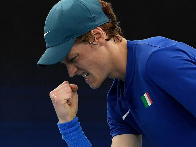 Jannik Sinner of Italy reacts on a point against Roman Safiullin of Russia during their Group B men's singles tennis match at the 2022 ATP Cup in Sydney on January 6, 2022. (Photo by Muhammad FAROOQ / AFP) / -- IMAGE RESTRICTED TO EDITORIAL USE - STRICTLY NO COMMERCIAL USE --