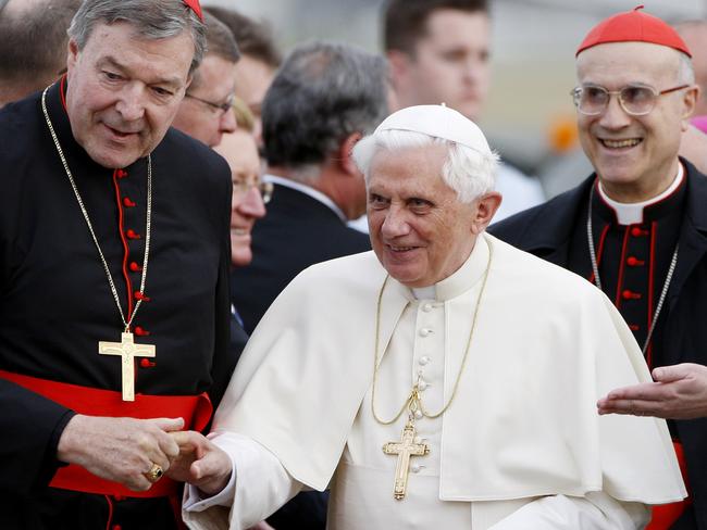 Pope Benedict XVI with Cardinal George Pell in 2008. The Church will no longer be able to invoke the ‘Ellis defence’ in legal proceedings against their organisation. Mark Baker