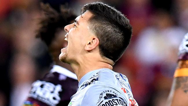 BRISBANE, AUSTRALIA - JULY 13: Kodi Nikorima of the Warriors shows his frustration after missing a shot at field goal in golden point extra time during the round 17 NRL match between the Brisbane Broncos and the New Zealand Warriors at Suncorp Stadium on July 13, 2019 in Brisbane, Australia. (Photo by Bradley Kanaris/Getty Images)