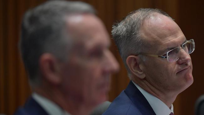 News Corp Australia Group Executive Campbell Reid, left, and News Corp Australia Executive Chairman Michael Miller, right, during the public hearing. Picture: Sam Mooy/Getty Images