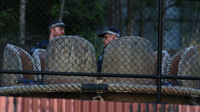 Police next to a raft similar to the one in which four people died. Photo: Regi Varghese