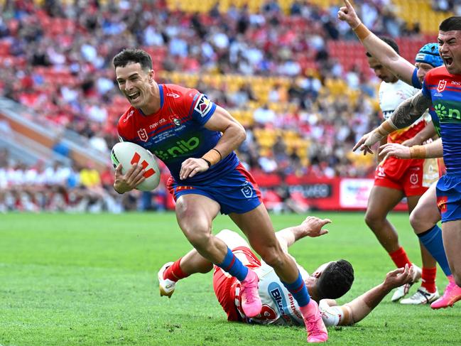 BRISBANE, AUSTRALIA - APRIL 28: David Armstrong of the Knights scores a try during the round eight NRL match between Dolphins and Newcastle Knights at Suncorp Stadium, on April 28, 2024, in Brisbane, Australia. (Photo by Bradley Kanaris/Getty Images)