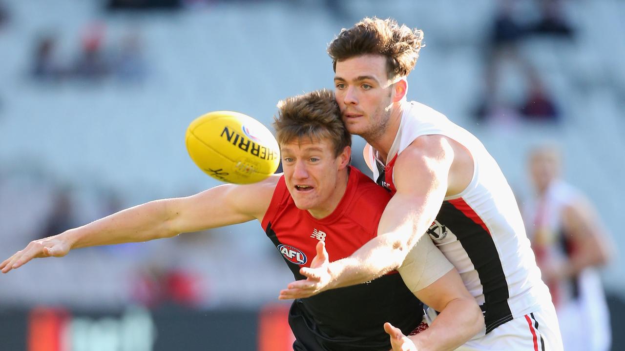 MELBOURNE, AUSTRALIA - JULY 26: Aaron Vandenberg of the Demons and Dylan Roberton of the Saints compete for the ball during the round 17 AFL match between the Melbourne Demons and the St Kilda Saints at Melbourne Cricket Ground on July 26, 2015 in Melbourne, Australia. (Photo by Quinn Rooney/Getty Images)