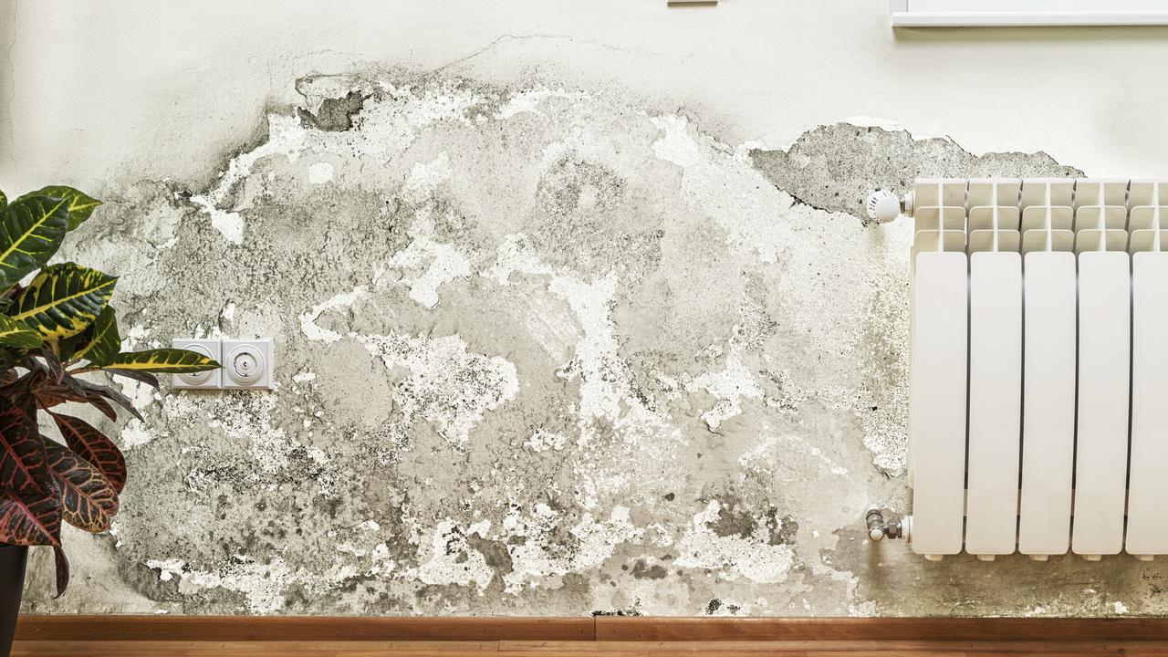 Damage caused by dampness on a wall in modern house.