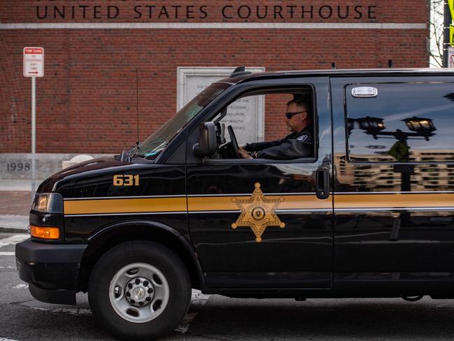 A Plymouth County Sheriff drives past the courthouse in Boston, Massachusetts where Jack Teixeira faced Espionage Act charges. Picture: AFP