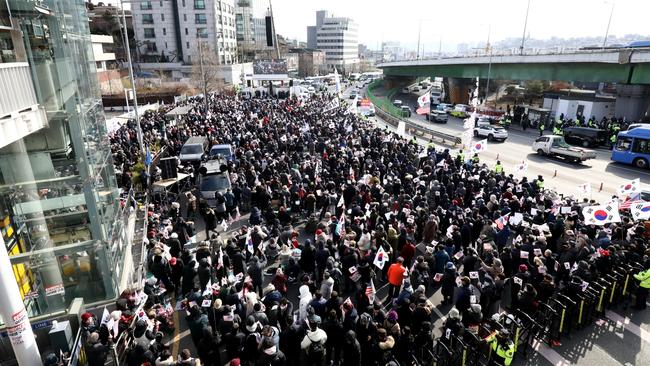 Pro-Yoon Suk Yeol supporters gather near the official residence of impeached South Korean President Yoon Suk Yeol on Friday. Picture: Getty Images