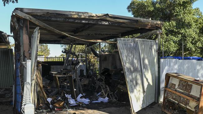 The charred wreck of the shed at Christies Downs. Picture Mark Brake