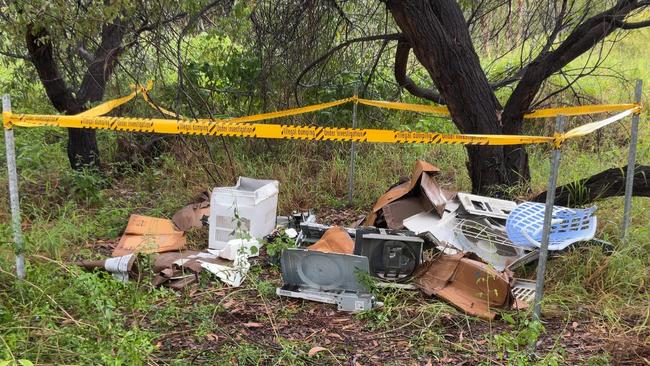 Dumped rubbish found in the Townsville Town Common in March, 2025. A ute was captured on remote cameras, and the driver was fined.