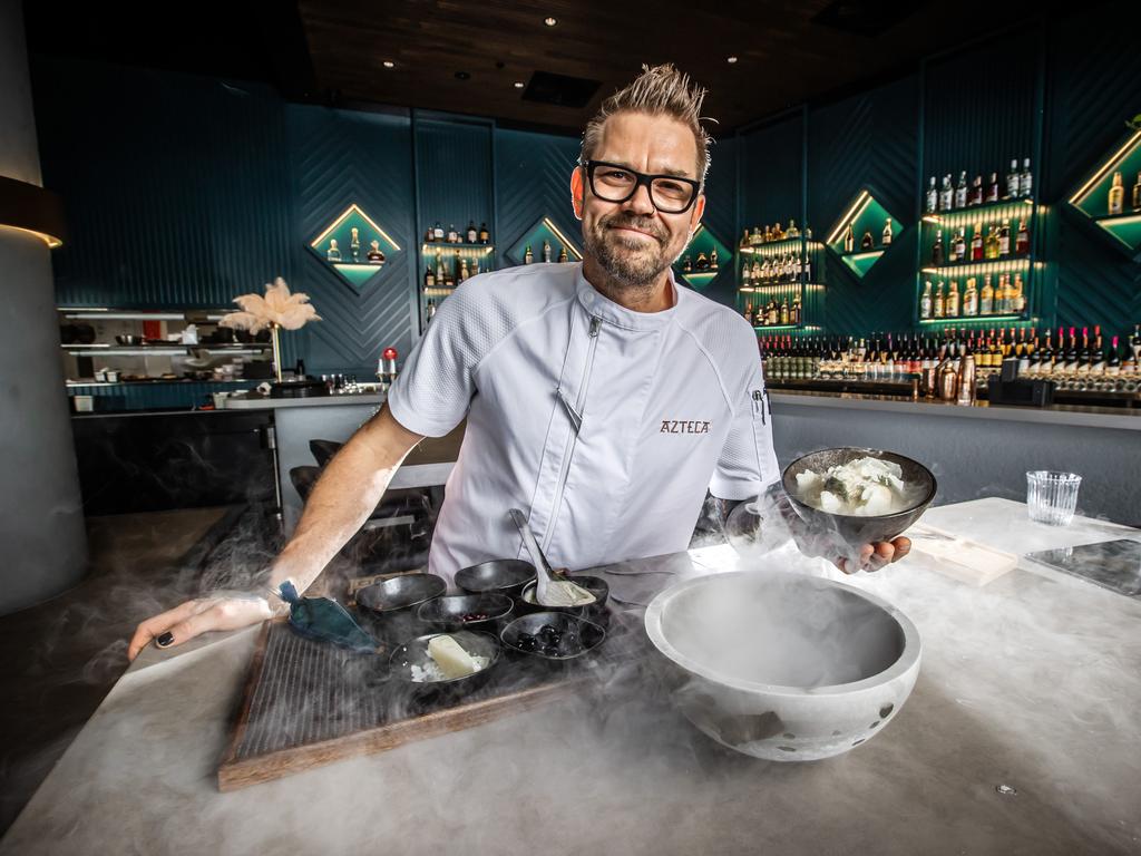 Chef Zac Sykes with the liquid nitrogen tres leche dessert at Azteca restaurant. Picture: Nigel Hallett