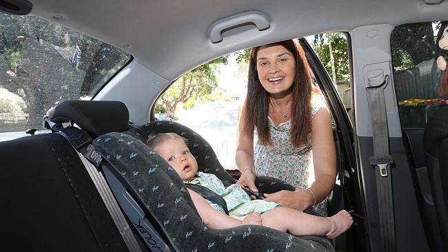 Michelle Reid and her daughter Sophia, 10 months, at Clovelly / Picture: Bob Barker