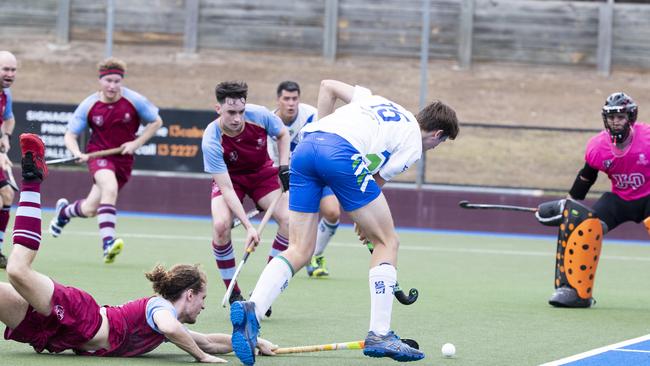 Typical desperation on grand final day - this was Div 3 action between Pine Rivers St Andrews and University of Queensland. Picture: Renae Droop