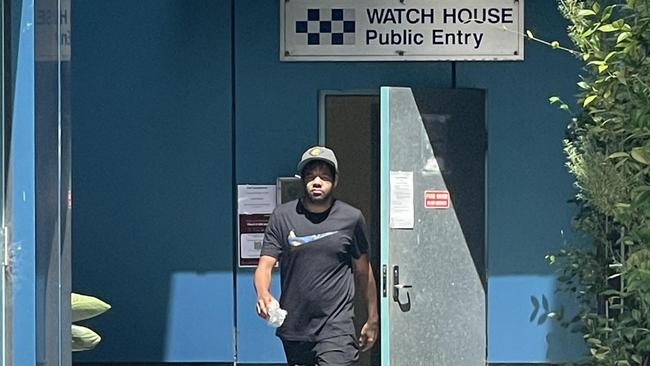 William John Currey leaves Toowoomba watch house after being sentenced to four months parole for damaging a police station wall and swearing at police.