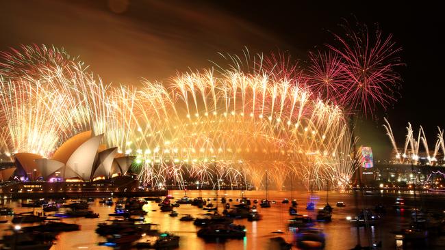 Could Sydney be any more beautiful? The view from Mrs Macquarie’s Chair during the midnight fireworks celebration. Picture: Jonathan Ng