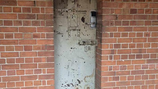 The door into one of the original prion cells, which is now used as a dorm room.