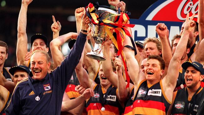 The pay-off ... Malcolm Blight celebrates the 1998 AFL Grand Final win with his team.