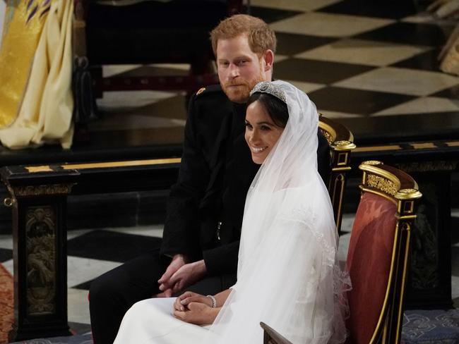 Britain's Prince Harry sits with Meghan Markle during their wedding. Picture: AP