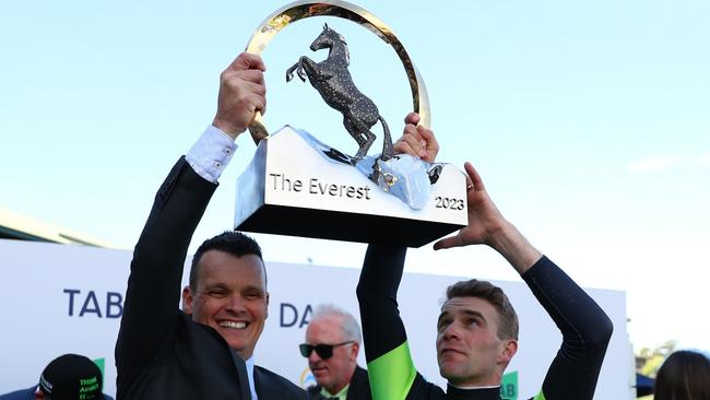 Trainer Joe Pride and jockey Sam Clipperton holding The Everest trophy. The race, won last year by Think About It, is set to carry Group 1 status. Picture: Jeremy Ng/Getty Images