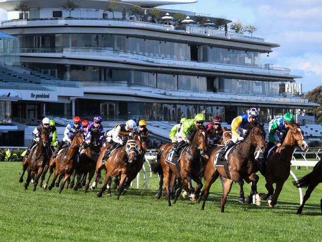 Horses on the first lap during the running of the The Lexus Bart Cummings at Flemington Racecourse on October 02, 2021 in Flemington, Australia. (Reg Ryan/Racing Photos via Getty Images)