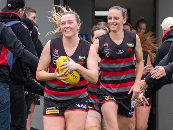 Annie Lord leads her side out to action.