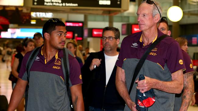 Anthony Milford and Wayne Bennett return home after the Broncos’ Round 1 loss.