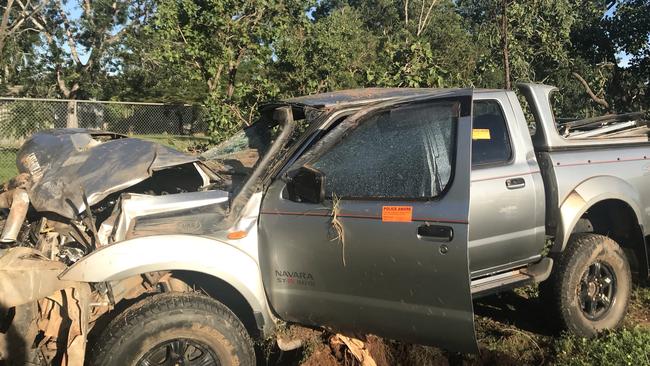 An 18-year-old man was lucky to pull himself from a single vehicle crash this morning on the Stuart Hwy after the car veered off the road and hit a tree. PICTURE: JUDITH AISTHORPE