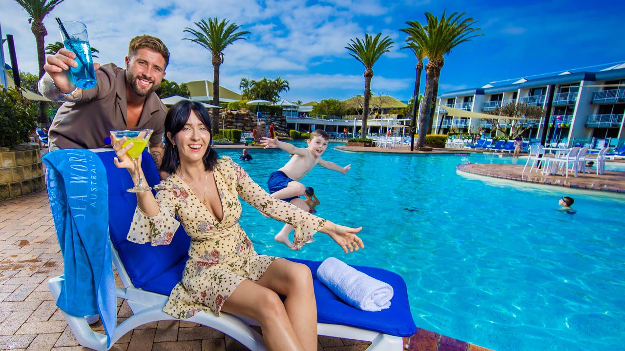 Brad James and Krystal Cairnes with Ty Shatford, 8 from the Blue Mountains NSW at Sea World Resort on the Gold Coast. Picture: Nigel Hallett