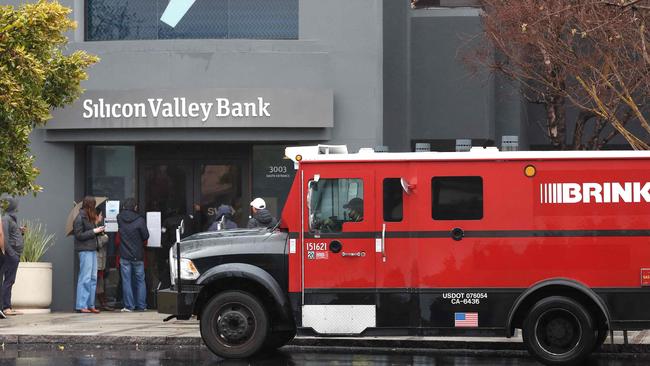 A Brinks armoured truck sits parked in front of the shuttered Silicon Valley Bank (SVB) headquarters on March 10 in Santa Clara, California. Picture: Justin Sullivan/Getty Images via AFP