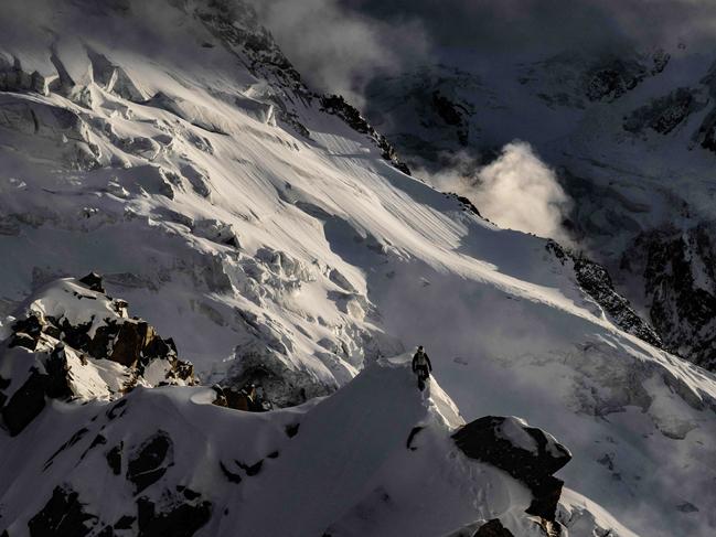 French mountaineer Charles Dubouloz walks on a ridge in the Mont Blanc Massif in the French Alps. Picture: Jeff Pachoud/AFP