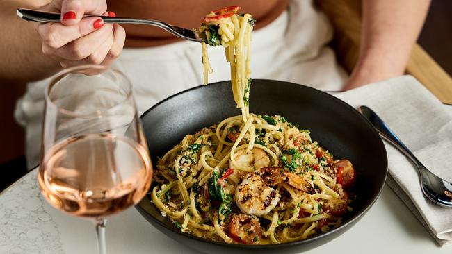 Inside new Adelaide restaurant Storehouse Flinders East. Spencer Gulf King Prawn Linguine blistered tomatoes garlic chilli wild rocket &amp; pangrattato