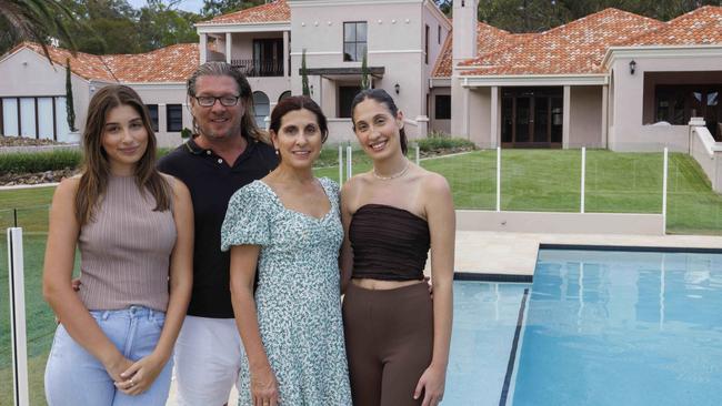 George and Rosemary Daiko at their Chandler home with their daughters Sylvie (left) and Giulia (right). Picture: Glenn Hunt/The Australian