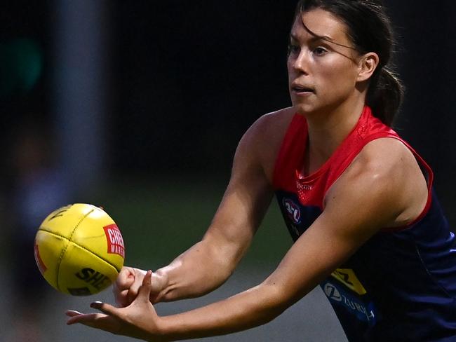 MELBOURNE, AUSTRALIA - APRIL 04: Libby Birch of the Demons handballs during a Melbourne Demons AFLW Training Session at Beaumaris Secondary College on April 04, 2022 in Melbourne, Australia. (Photo by Quinn Rooney/Getty Images)