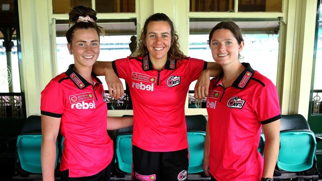 Sydney Sixers young gun Alisha Bates with teammates Emma Hughes and Maddy Darke a the SCG.