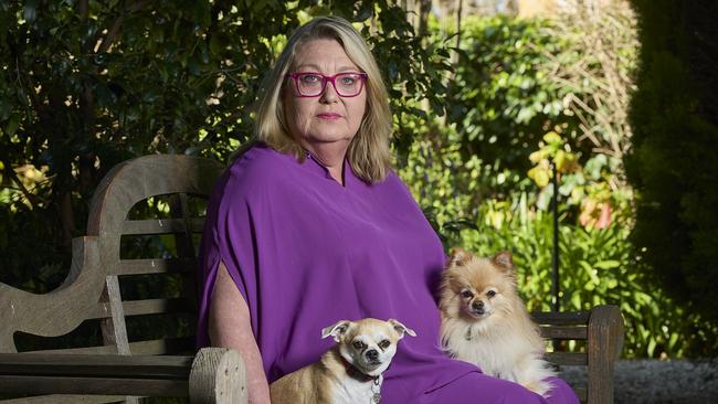 Jane Price with her dogs, Baby, 7, and Teddy, 7, at home in Toorak Gardens, after concern over Australian pet owner spending reached up to $33 billion annually on pet care, Monday, Sept. 11, 2023. Picture: Matt Loxton