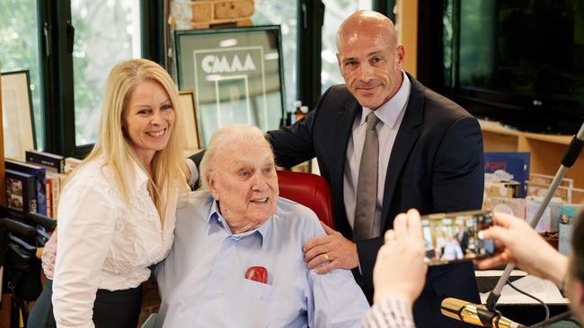 Despina Priala and George Caralis, owners of 2SM Super Radio Network, congratulate radio star John Laws, at the end of his final show on 2SM Radio. Picture: Max Mason-Hubers