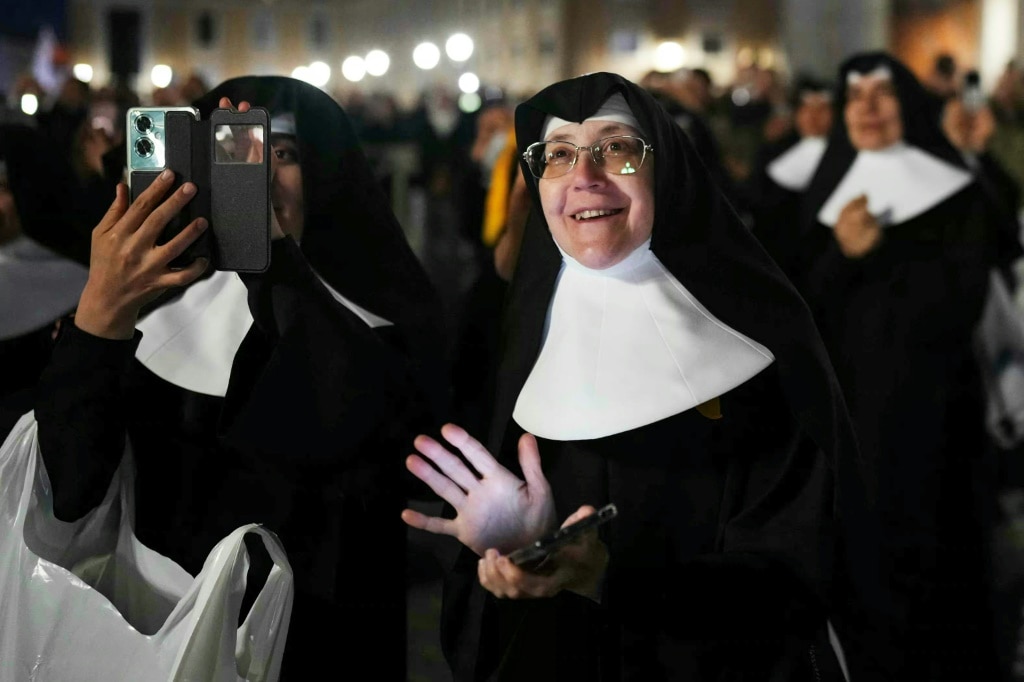 All eyes on Sistine Chapel chimney as conclave enters day two