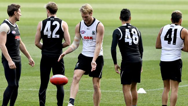 Port Adelaide player Jack Watts, middle, at Port training this week. He will spend another week in the SANFL. Picture: AAP Image/Sam Wundke