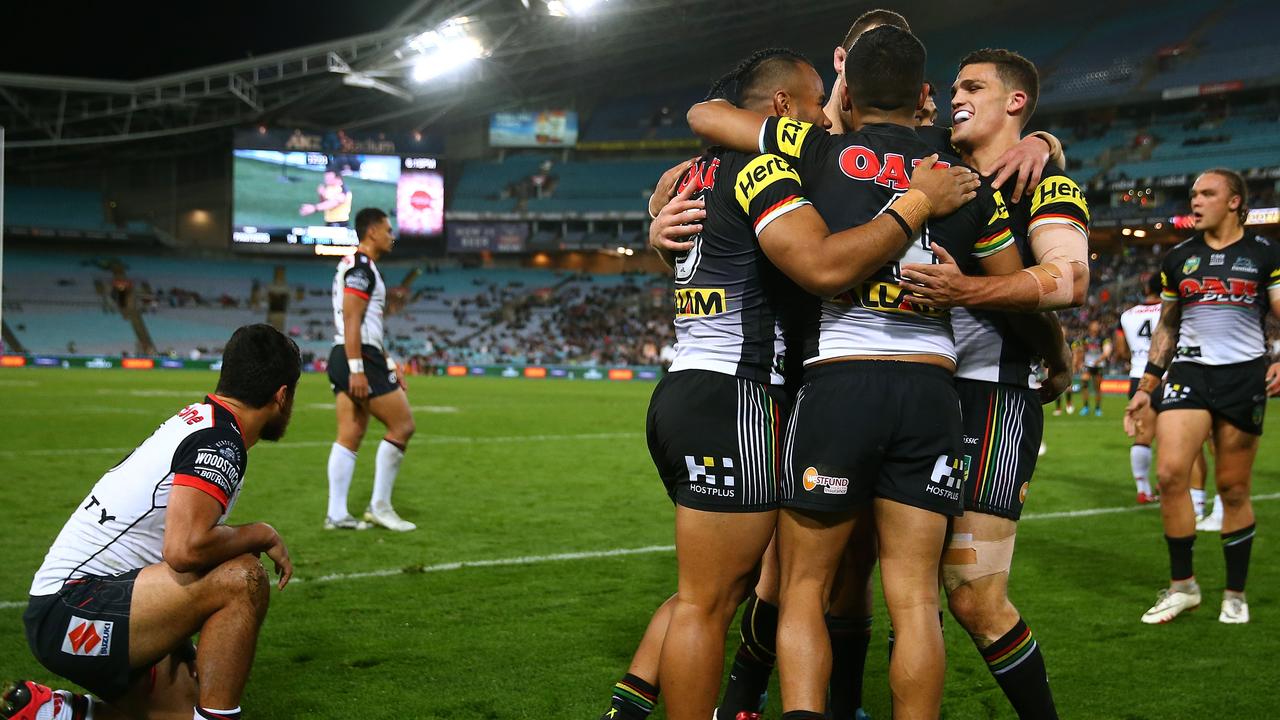 The Panthers celebrate a try to Christian Crichton.